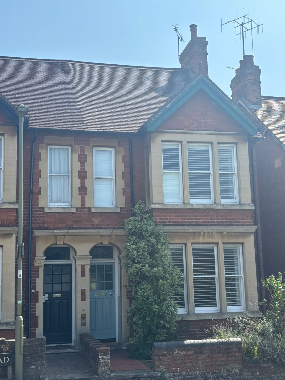 Victorian-style semi-detached property with a newly installed natural slate roof by White Horse Roofing Services, Oxfordshire