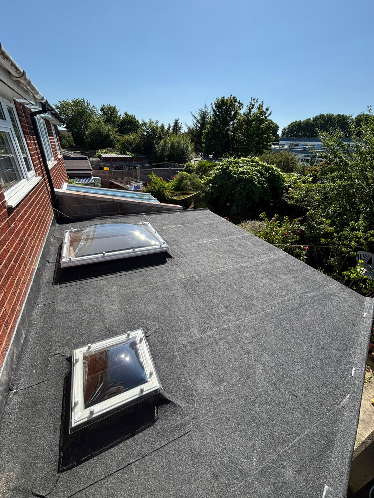 New EPDM flat roof with roof lanterns installed by White Horse Roofing, Oxfordshire